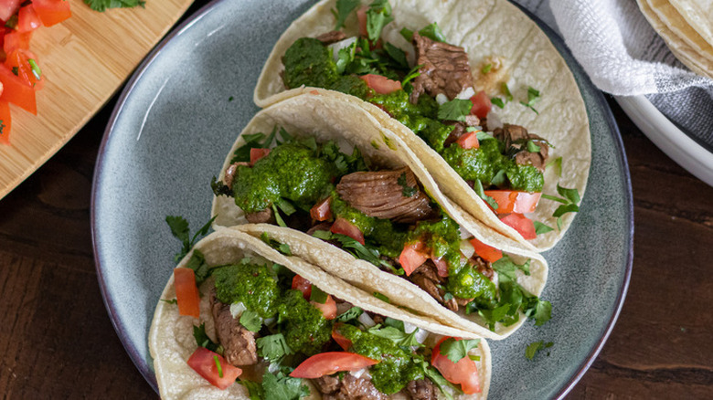 Tortillas with steak and herb sauce