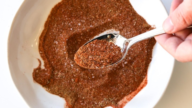 Red spice mixture with teaspoon