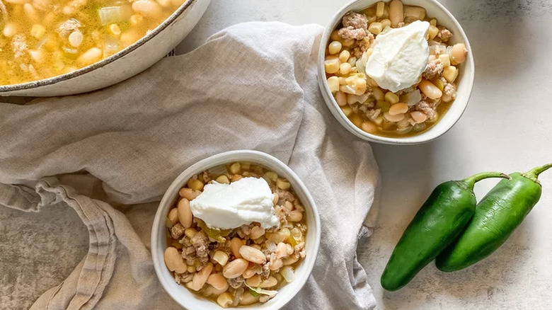 Small bowls of white turkey bean chili