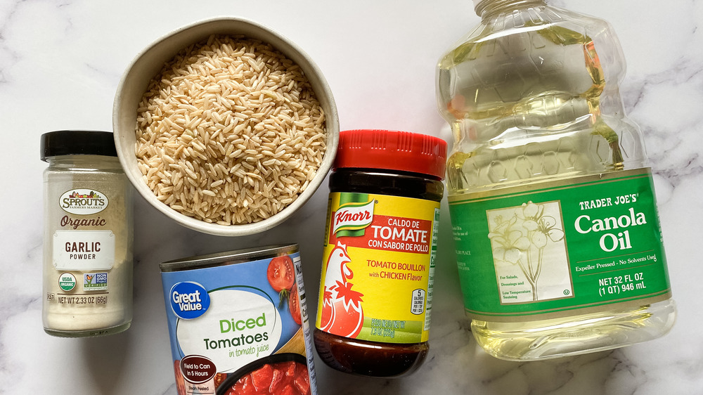 Mexican rice ingredients placed on counter