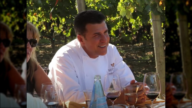 Michael Chiarello at a dining table