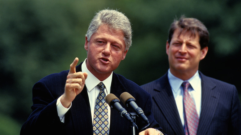 Bill Clinton and Al Gore at a podium