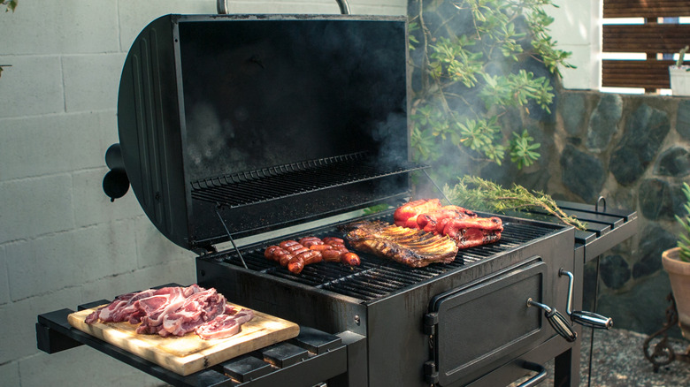 Food cooking on barbecue grill