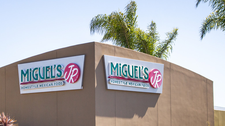 Miguel's Jr. sign with palm trees