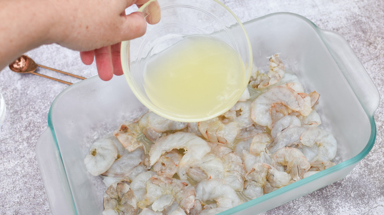 lime juice poured over shrimp