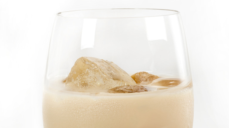 glass of milk liqueur