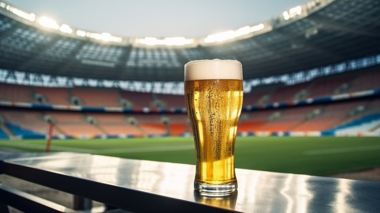 Glass of beer at football stadium