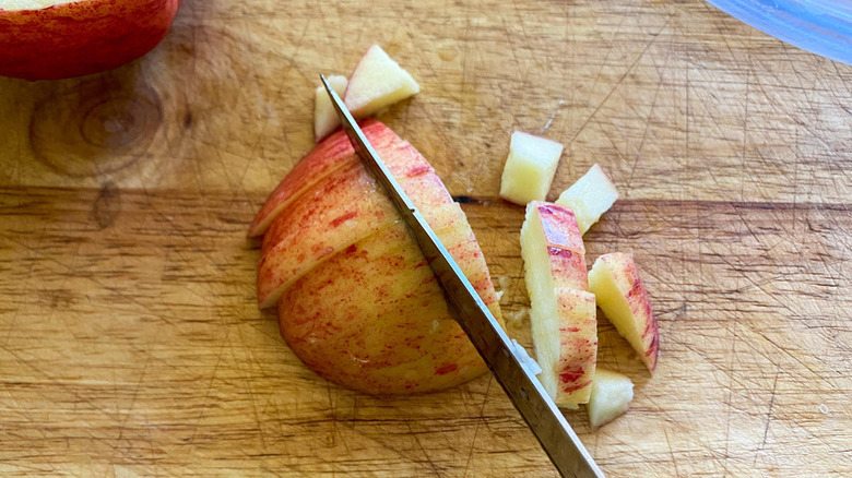 chopping apples for mini apple pies