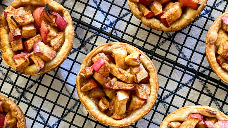 mini apple pies cooling from oven