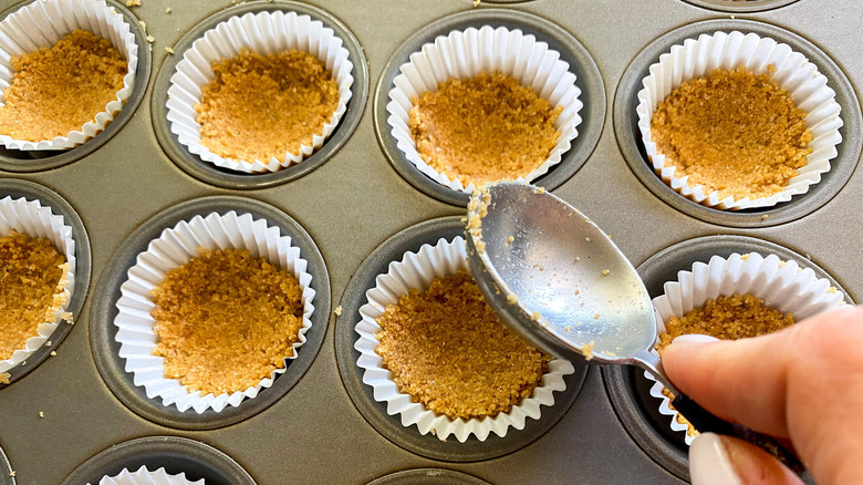 graham crackers in muffin tin 