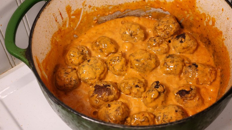 pot of meatballs in vodka sauce