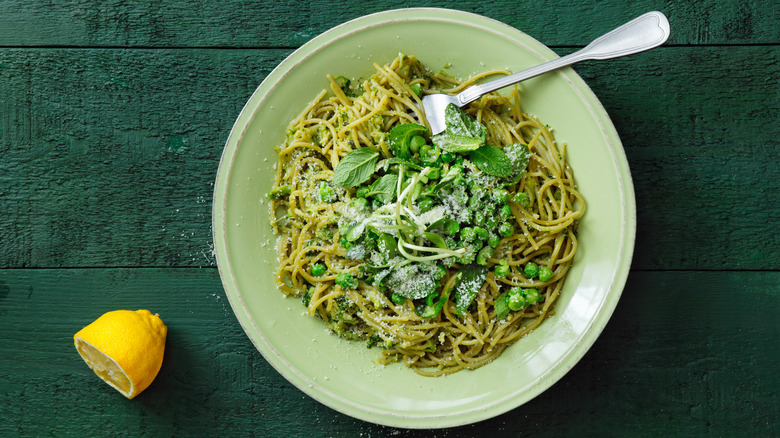 Plate of pasta with mint and peas