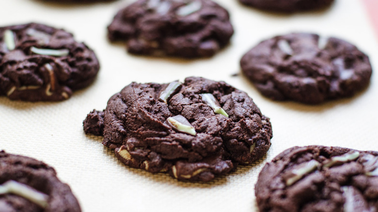 Cookies sit on a baking sheet