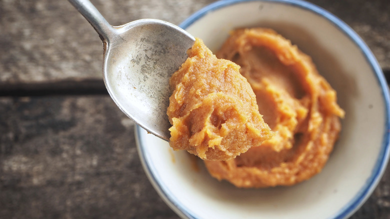 Miso paste in white bowl