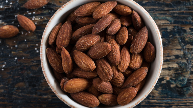 Roasted salted almonds in bowl