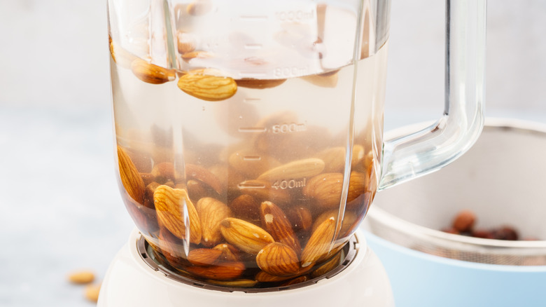 Almonds and water in blender