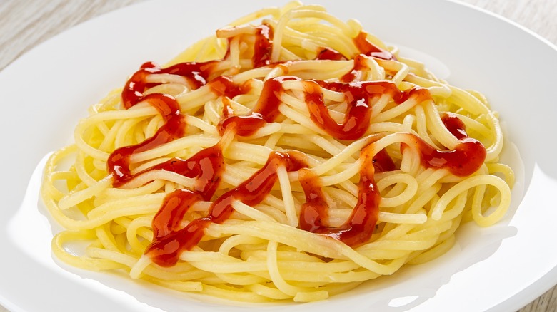ketchup on plate of spaghetti