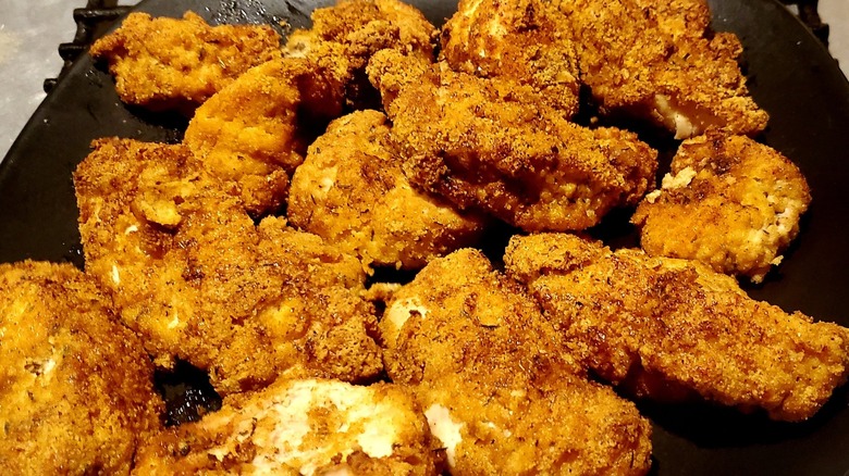 Mistakes Everyone Makes Cooking Fried Chicken In The Air Fryer