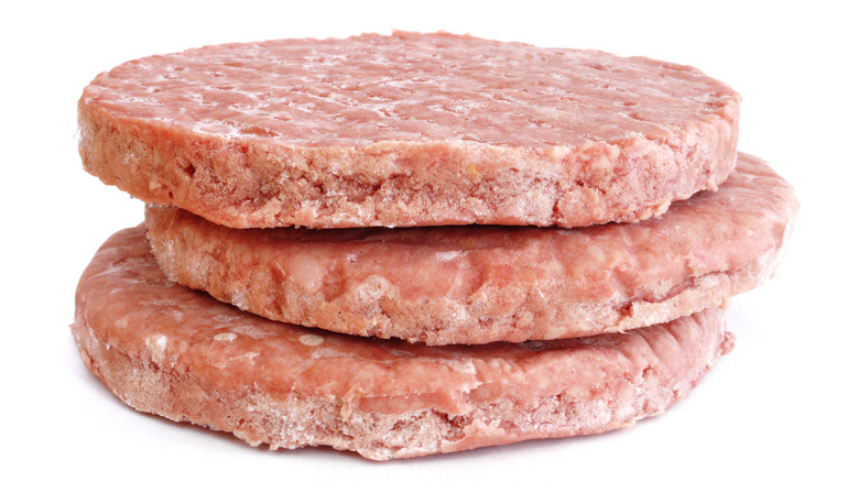 Stack of frozen hamburger patties