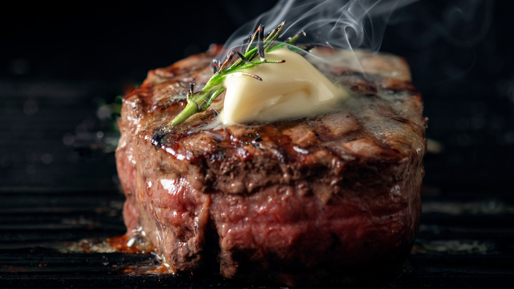 Butter melting on top of steak