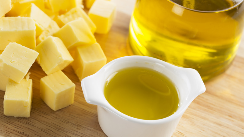cubed butter next to ramekin of oil