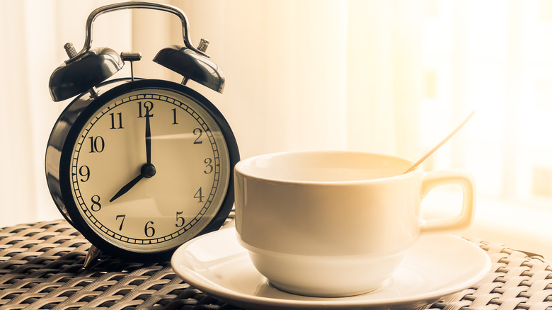 Ceramic teacup with clock