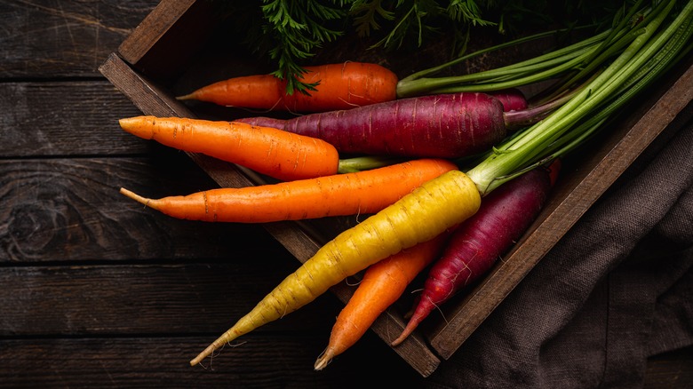 orange, yellow, and purple carrots