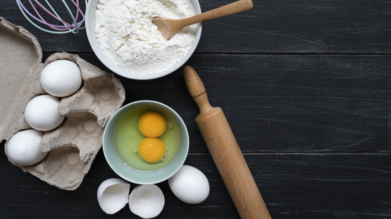 eggs flour with rolling pin