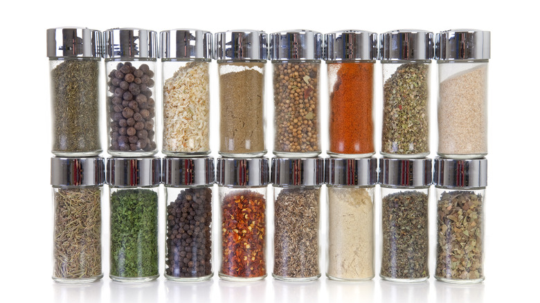 assorted spices in glass jars