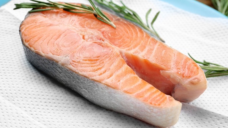 salmon fillet on paper towel