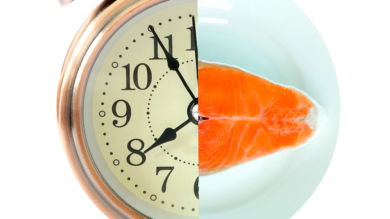 half clock face half salmon fillet