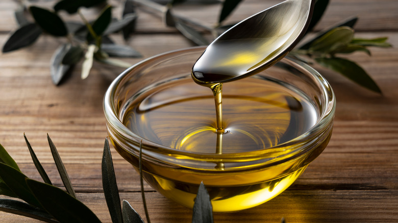 Olive oil in a transparent bowl