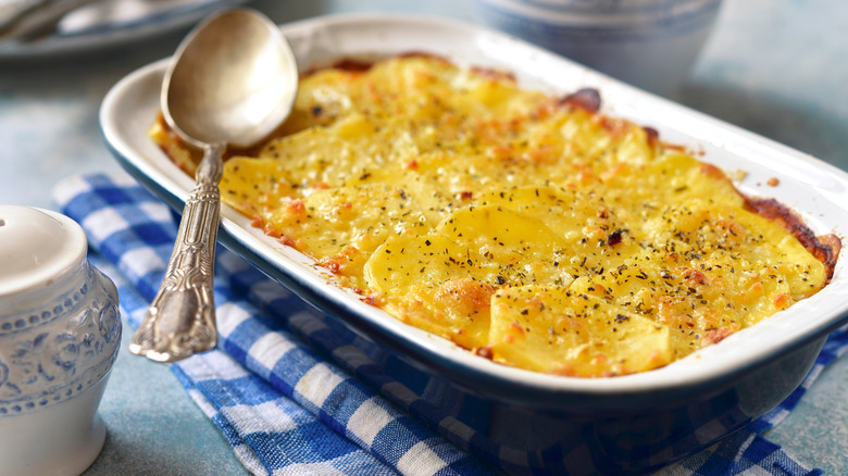 scalloped potatoes in baking dish