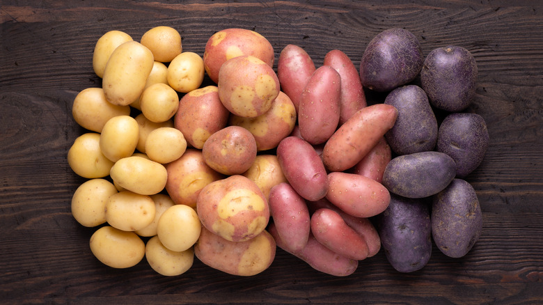 potatoes on wooden table