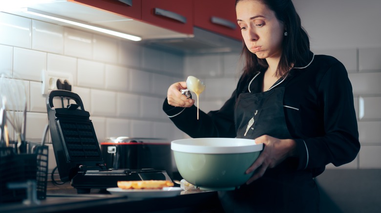 Stressed woman with batter 