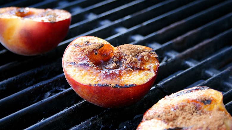 peaches cooking on grill