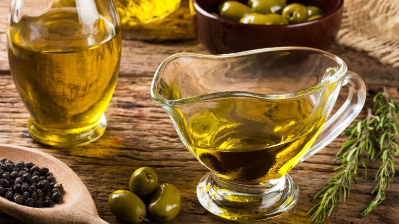 olive oil in glass serving vessels