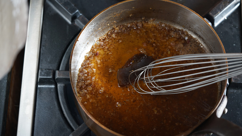 making sauce in deglazed pan