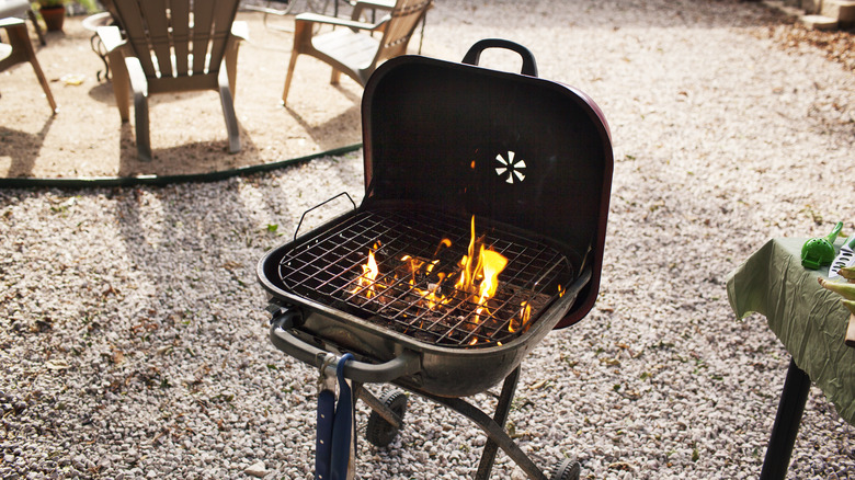 lit charcoal grill