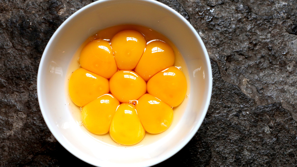 a bowl full of egg yolks