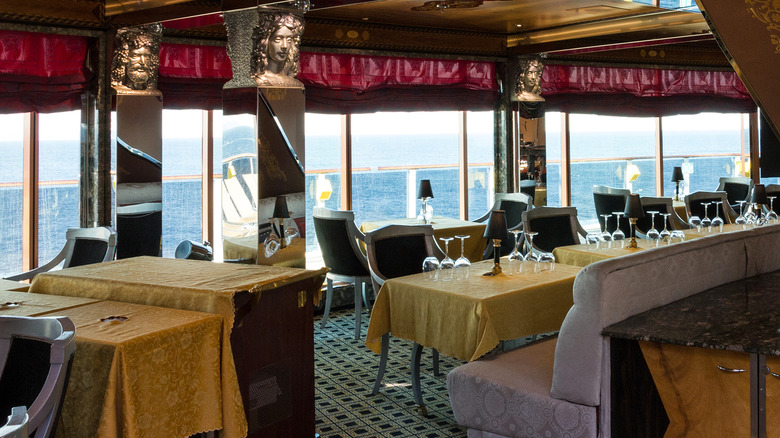 Cruise ship dining room with view of sea