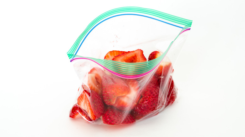 Open zippered bag of fruit