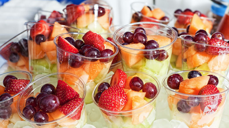 Cups of fruit on ice