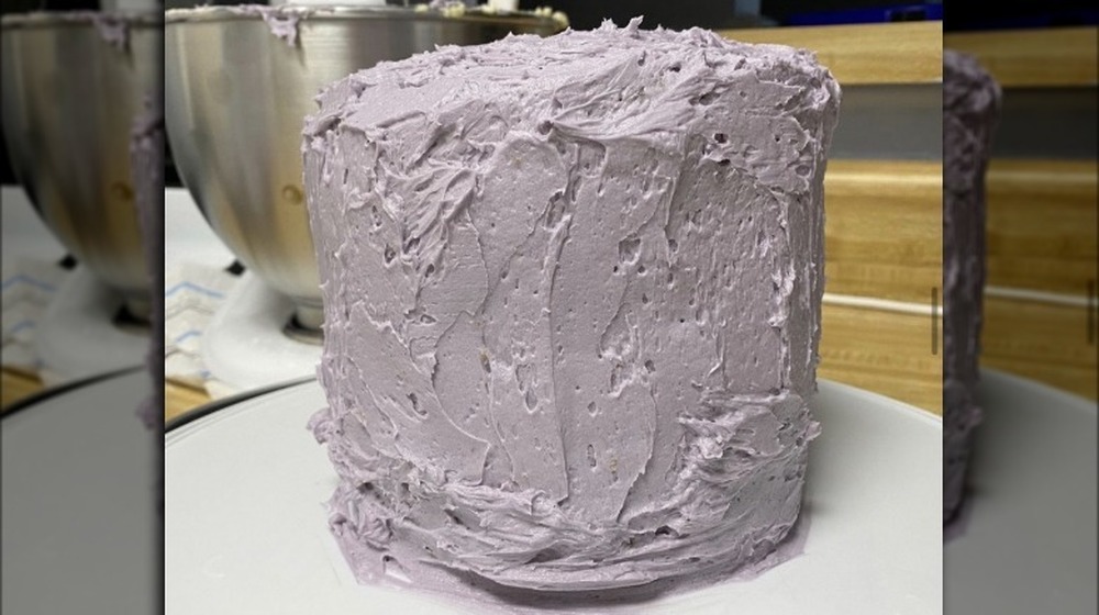 Cake with overwhipped purple frosting