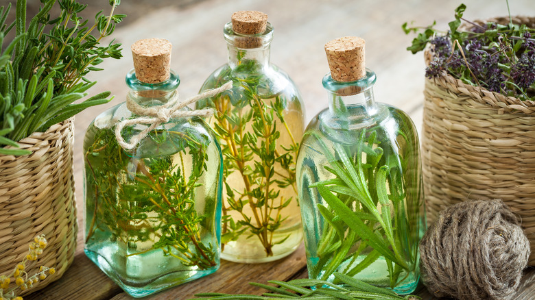 Corked bottles with herb-infused liquor