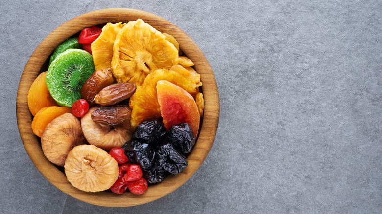 Dried fruits in wooden bowl