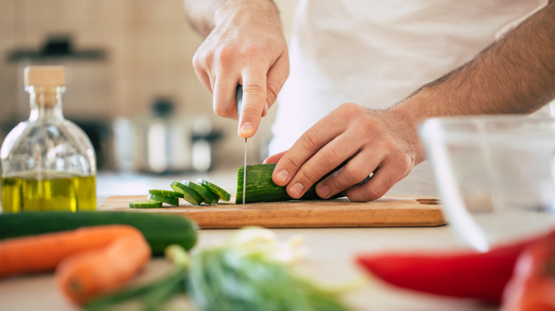 Cutting vegetables on board