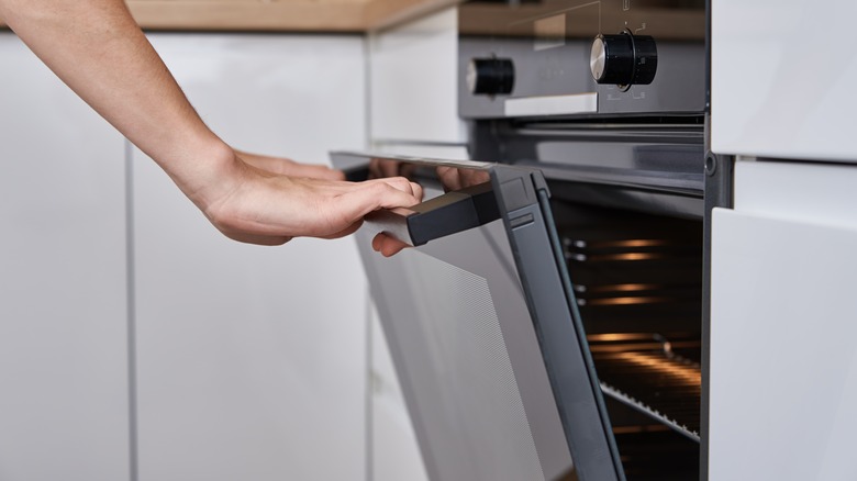 Opening an oven door