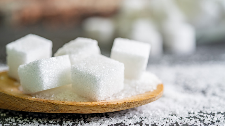 sugar cubes on black backround