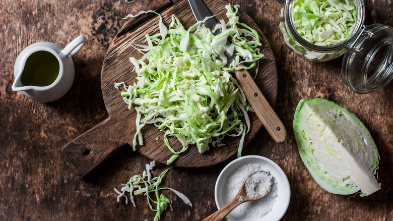 Cut cabbage on wooden chopping board